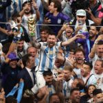 LUSAIL CITY, QATAR - DECEMBER 18: Lionel Messi of Argentina celebrates with the world cup trophy following his sides victory  during the FIFA World Cup Qatar 2022 Final match between Argentina and France at Lusail Stadium on December 18, 2022 in Lusail City, Qatar. (Photo by Alex Pantling/Getty Images)