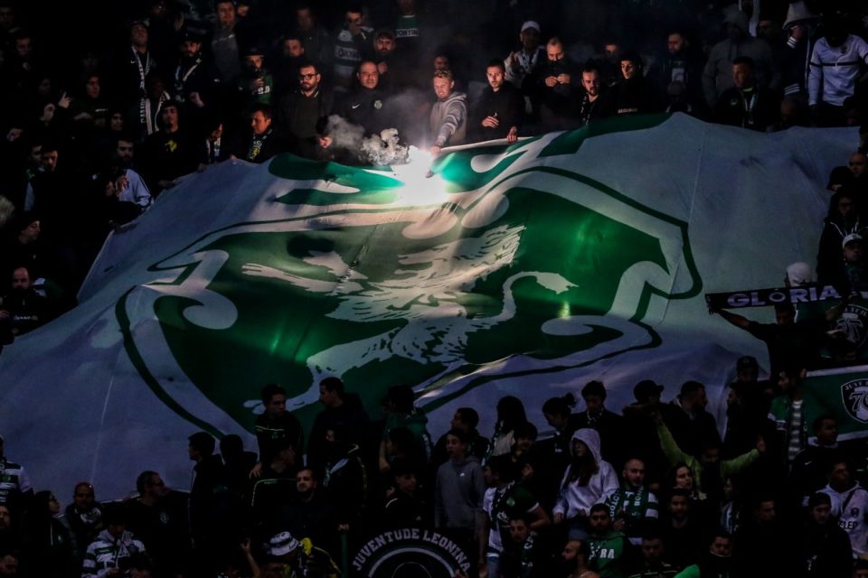 Sporting supporters light up flares during the Portuguese League football match between Sporting CP and FC Porto at the Alvalade stadium in Lisbon on February 12, 2023. (Photo by CARLOS COSTA / AFP) (Photo by CARLOS COSTA/AFP via Getty Images)