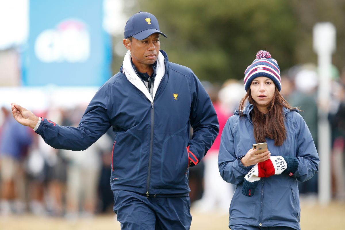 Tiger Woods (I) junto a su ex novia Erica Herman (D). 